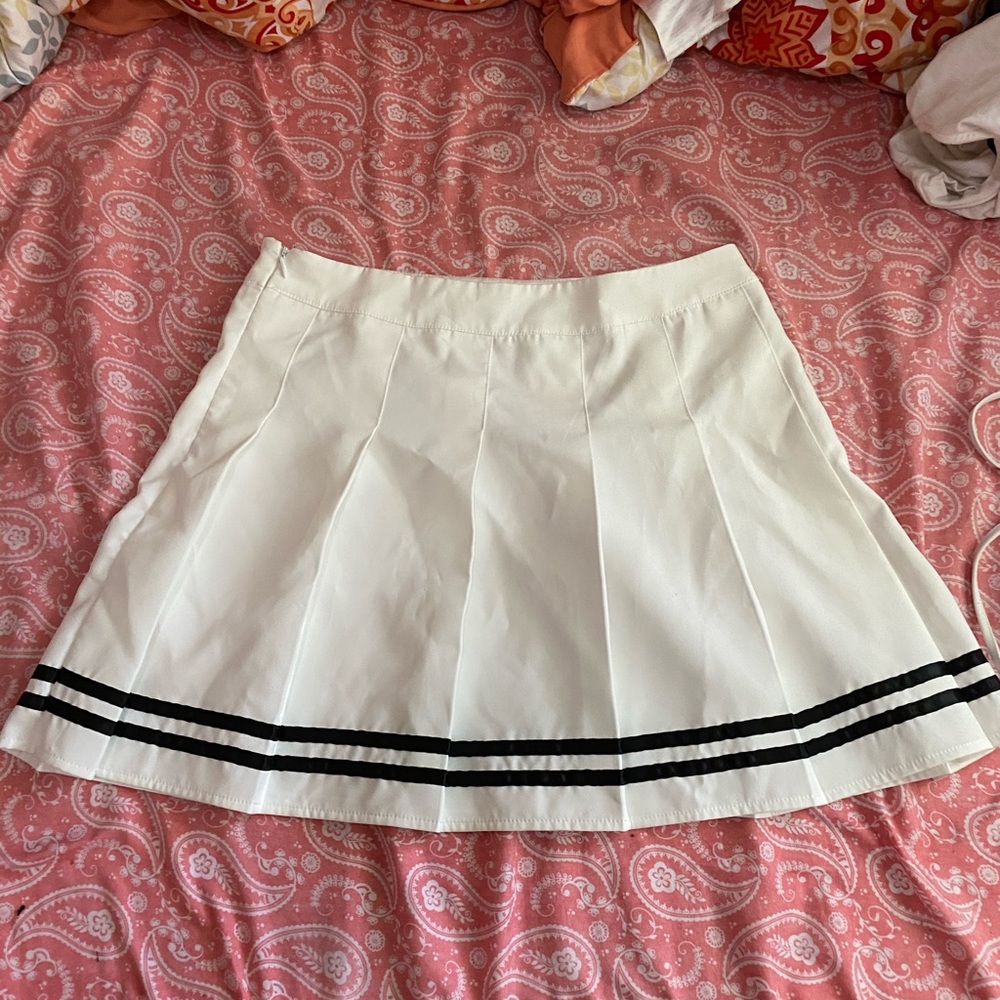 White pleated skirt